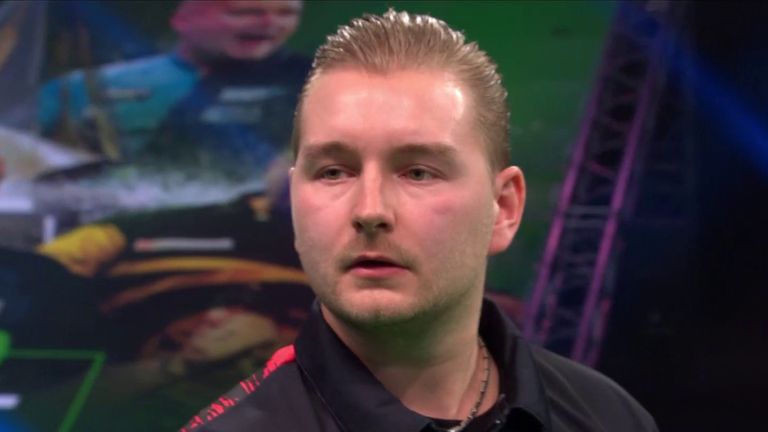 Dimitry Van den Bergh hits a century checkout in his match against Peter Wright in the Premier League of Darts.