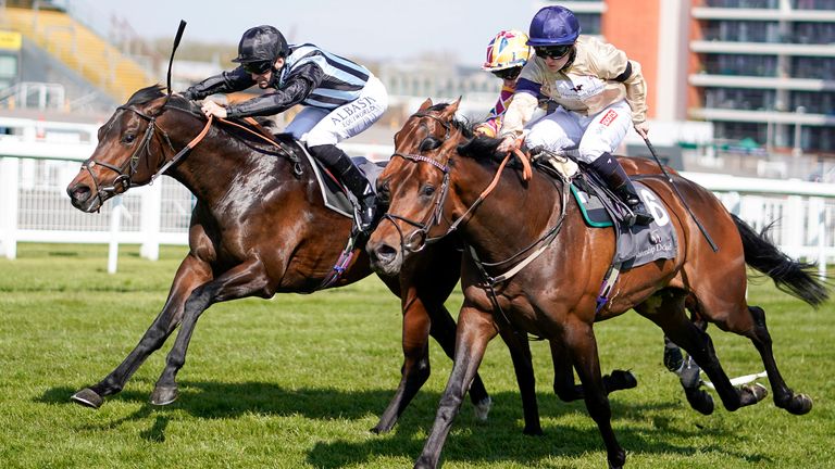 Pat Dobbs riding Chindit (left) win the Watership Down Stud Too Darn Hot Greenham Stakes at Newbury