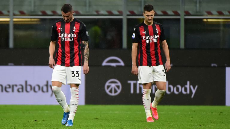 AC Milan's slim Serie A title hopes were dashed by a 2-1 home defeat to Sassuolo