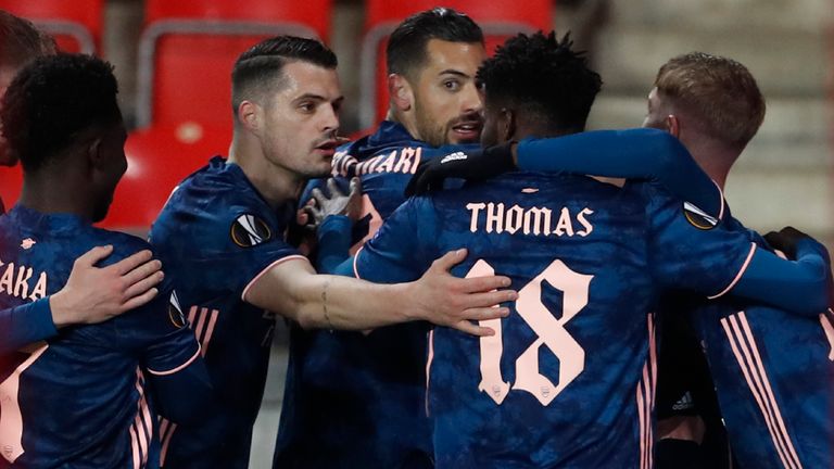 Arsenal's Alexandre Lacazette celebrates with his teammates after scoring his side's second goal from the penalty spot during the Europa League quarter final second leg soccer match between Slavia Prague and Arsenal 