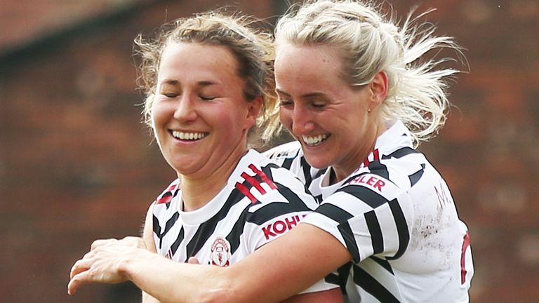 Manchester United's Amy Turner (left) celebrates scoring her side's fourth goal against Aston Villa with Millie Turner