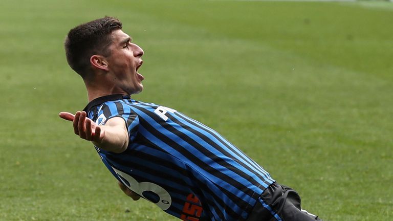 Atalanta's Ruslan Malinovskyj celebrates after scoring his side's first goal