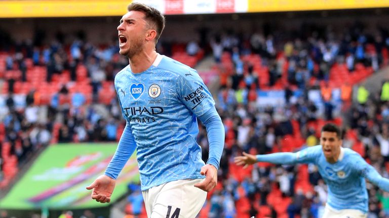 Aymeric Laporte celebrates scoring late in the second half