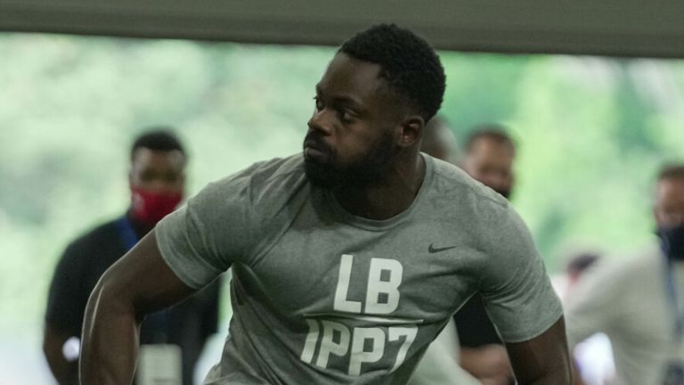 Ayo Oyelola works out in front of coaches and scouts