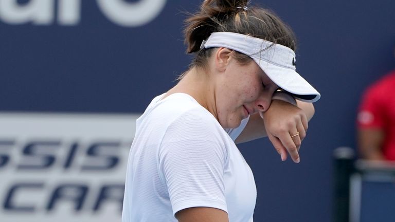 Bianca Andreescu of Canada walks off the court as she retired during her finals match against Ashleigh Barty of Australia at the Miami Open tennis tournament, Saturday, April 3, 2021, in Miami Gardens, Fla. Barty won 6-3, 4-0, as Andreescu retired due to injury. (AP Photo/Lynne Sladky)