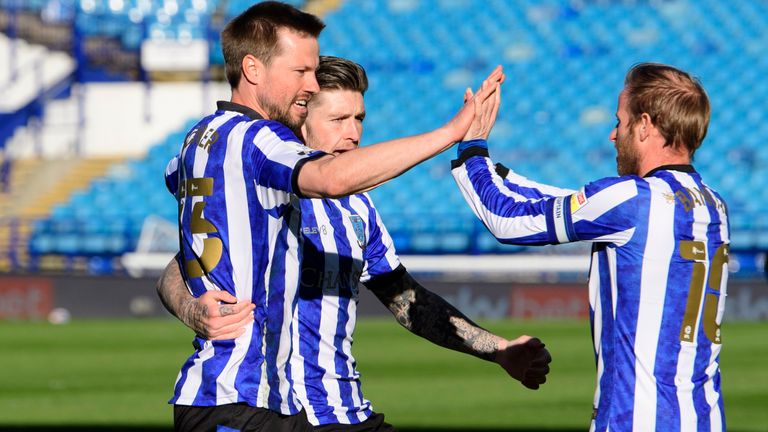 Sheffield Wednesday's Julian Borner, left, celebrates scoring the opening goal                                                                                                           