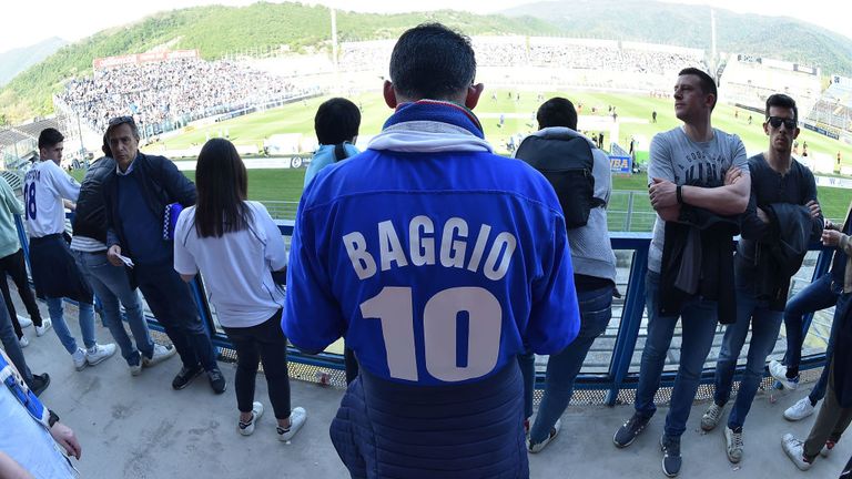 A fan of Brescia Calcio wearing a shirt of Roberto Baggio celebrates the victory of the Serie B championship after the Serie B match between Brescia Calcio and Ascoli Calcio 1898 FC at Stadio Mario Rigamonti on May 1, 2019 in Brescia, Italy.
