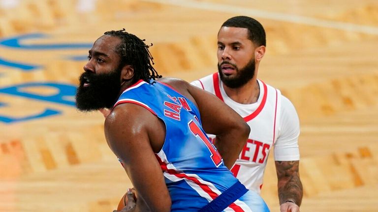 NBA - Brooklyn Nets&#39; James Harden, right, drives past Houston Rockets&#39; D.J. Augustin 