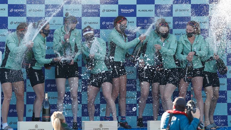 Cambridge women celebrate their win over Oxford