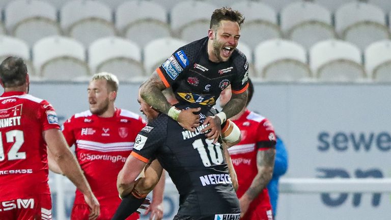 Gareth O'Brien celebrates with Grant Millington after kicking the winning drop-goal in Golden Point Extra Time.