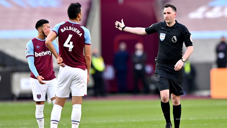 Chris Kavanagh dismisses Balbuena after consulting the pitchside monitor