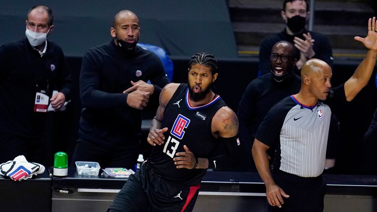 Los Angeles Clippers guard Paul George reacts after making a 3-point basket