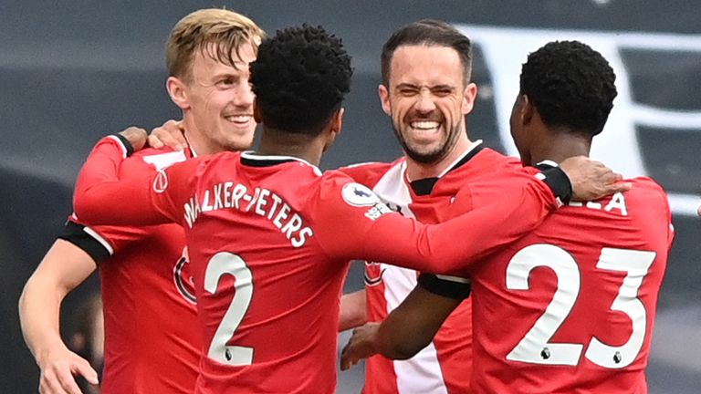 Danny Ings is mobbed after giving Southampton the lead at Tottenham