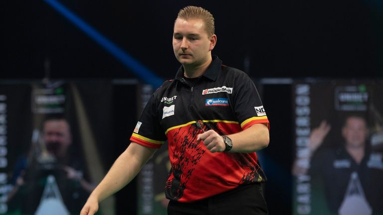 Dimitri Van den Bergh was too strong for Jonny Clayton in their top of the table Premier League Darts clash (Lawrence Lustig/PDC)