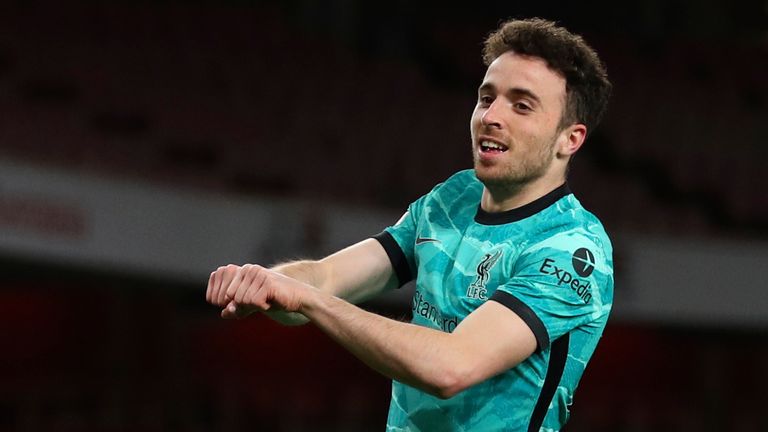 Diogo Jota celebrates the first of his tow goals (AP)