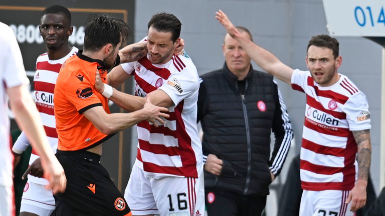 Marc McNulty and Aaron Martin clash as tempers flared at the FOYS Stadium