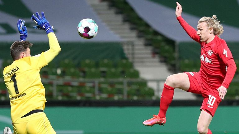 Emil Forsberg scores past Bremen's Czech goalkeeper Jiri Pavlenka to send RB Leipzig into the German Cup final