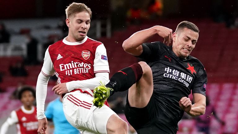 Emile Smith Rowe is denied a tap in by a last-ditch tackle after Alexandre Lacazette hit the bar