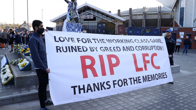 Liverpool fans protest the proposed European Super League before their game at Leeds
