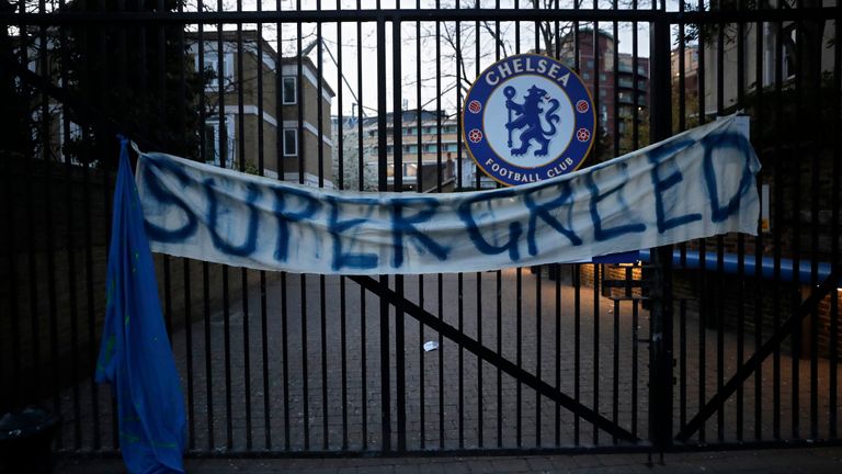AP - 'Supergreed' banner outside Stamford Bridge