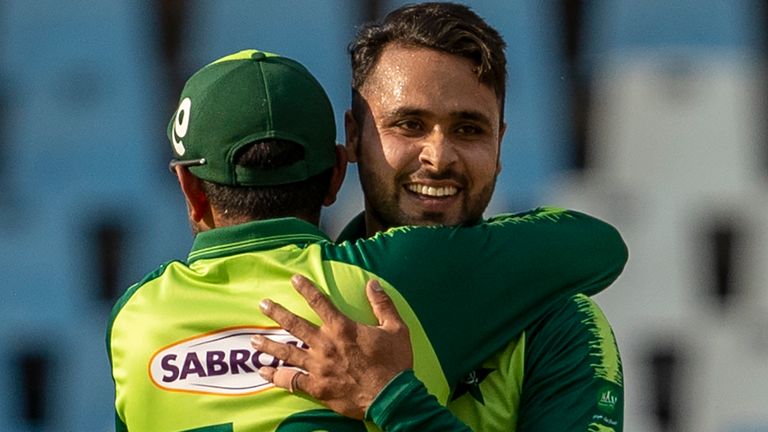 Pakistan's Faheem Ashraf, right, celebrates with captain Babar Azam after dismissing South Africa's George Linde