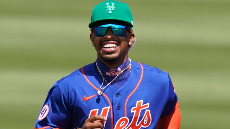 New York Mets shortstop Francisco Lindor runs to the dugout during a spring training baseball game against the Miami Marlins, Wednesday, March 17, 2021, in Jupiter, Fla. (AP Photo/Lynne Sladky)