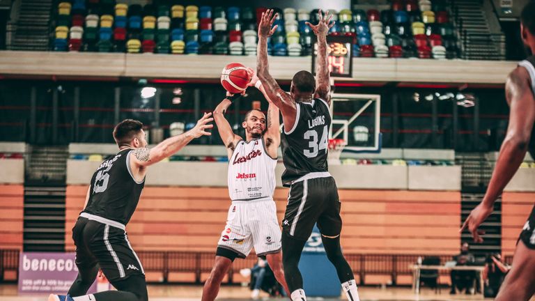 Crandall looks for a teammate in the Riders' clash with the London Lions