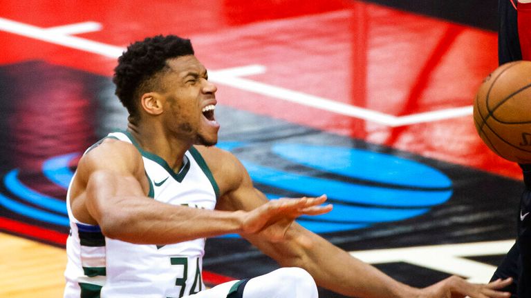 AP - Milwaukee Bucks forward Giannis Antetokounmpo (34) reacts as he falls during the first quarter 