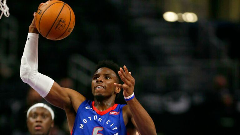 AP - Detroit Pistons guard Hamidou Diallo (6) goes to the basket past Dallas Mavericks forward Tim Hardaway Jr. (11) 