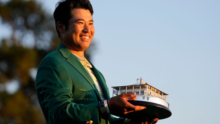 Hideki Matsuyama, of Japan, holds the trophy after winning the Masters golf tournament on Sunday, April 11, 2021, in Augusta, Ga.  (AP Photo/Matt Slocum)    
