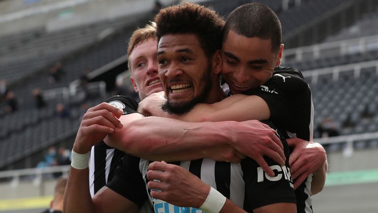 Joelinton celebrates after putting Newcastle ahead against Tottenham