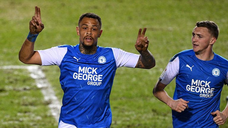 PA - Jonson Clarke-Harris (left) has been in prolific form this season for promotion chasing Peterborough