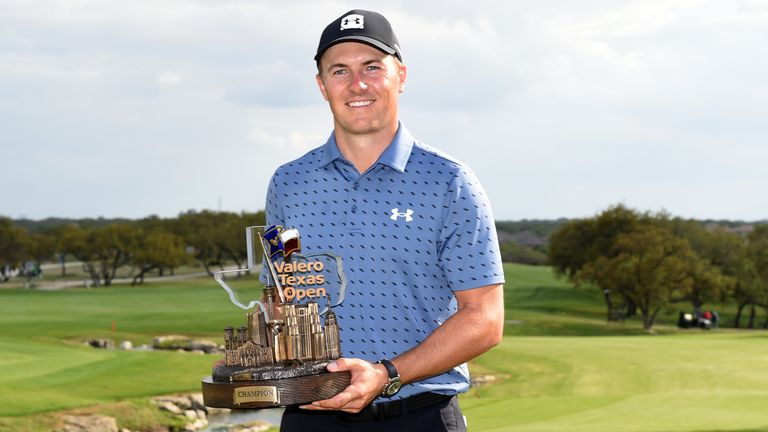 Jordan Spieth poses with the trophy after putting in to win during the final round of Valero Texas Open at TPC San Antonio Oaks Course