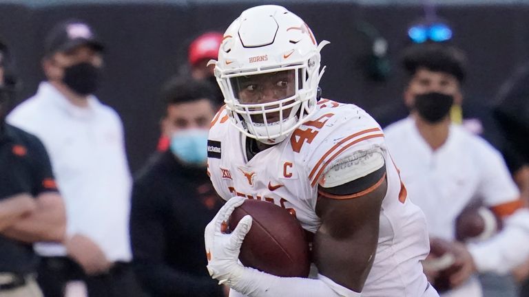 Texas' Joseph Ossai - AP 