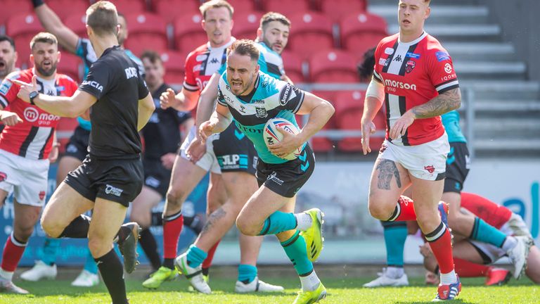 Josh Reynolds goes on to score a try