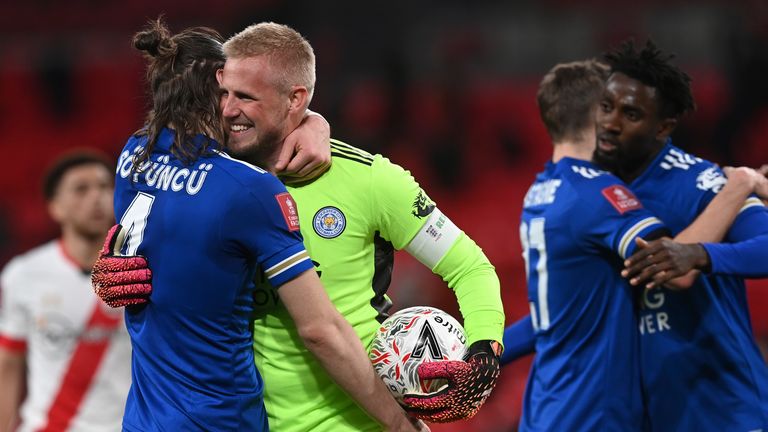 Kasper Schmeichel and Caglar Soyuncu celebrate at the final whistle