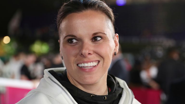 San Francisco 49ers offensive assistant coach Katie Sowers speaks to the media during Opening Night for the NFL Super Bowl 54 football game, Monday, Jan. 27, 2020, in Miami. (AP Photo/Steve Luciano)