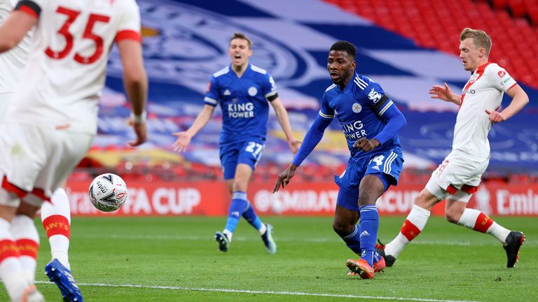 Iheanacho guides his shot into the net for Leicester on Sunday