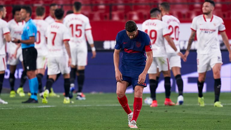 Atletico's title charge was dealt a blow with defeat at Sevilla on Sunday