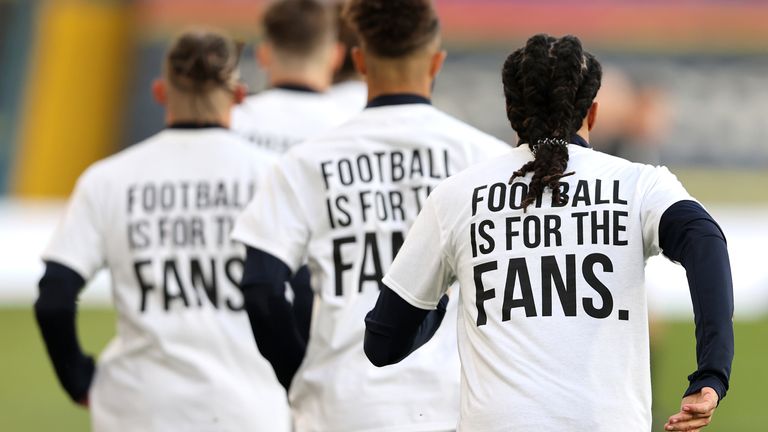 Leeds United v Liverpool - Premier League - Elland Road
Leeds United players wearing &#39;Football Is For The Fans&#39; shirts during the warm-up prior to kick-off during the Premier League match at Elland Road, Leeds. Picture date: Monday April 19, 2021.