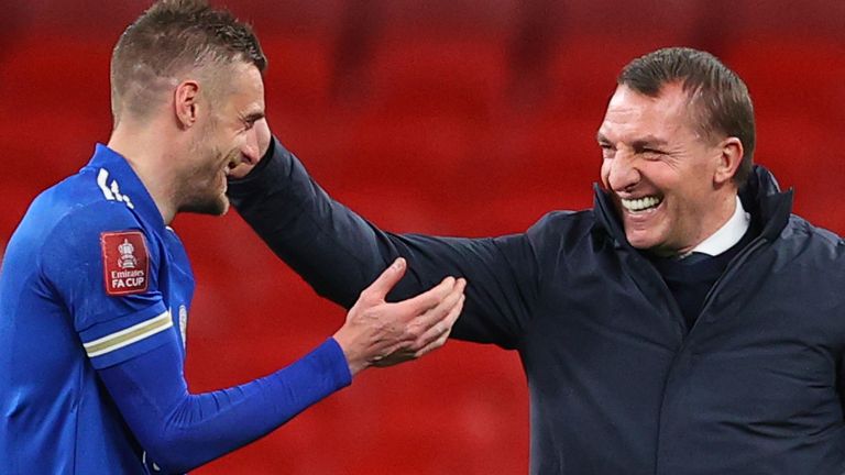 Leicester's Jamie Vardy, left, celebrates with Leicester's manager Brendan Rodgers at the end of the English FA Cup semifinal soccer match between Leicester City and Southampton at Wembley Stadium in London, Sunday, April 18, 2021. 