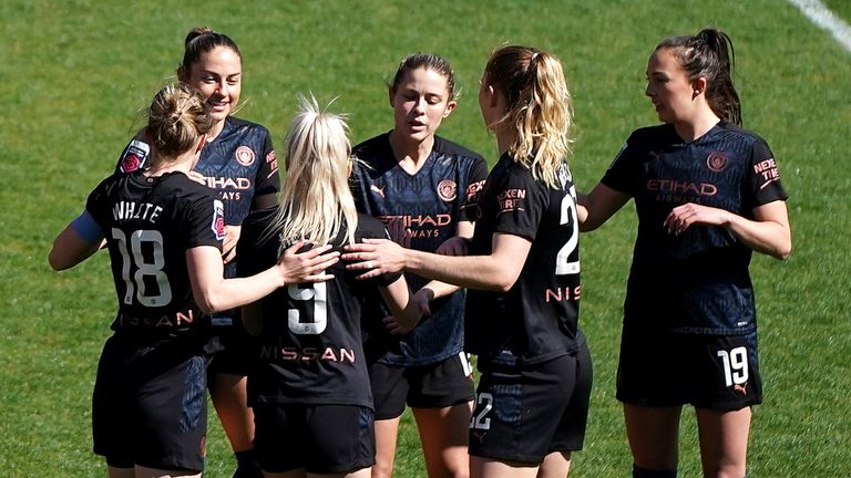 Man City players celebrate Janine Beckie's goal against Tottenham in WSL