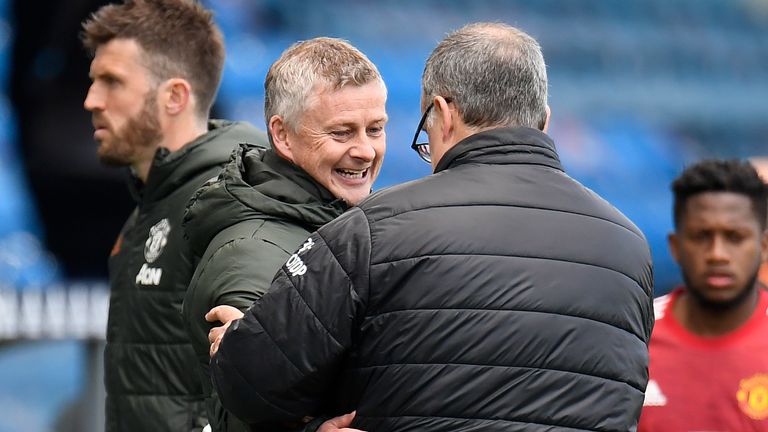 Leeds head coach Marcelo Bielsa embraces Ole Gunnar Solskjaer