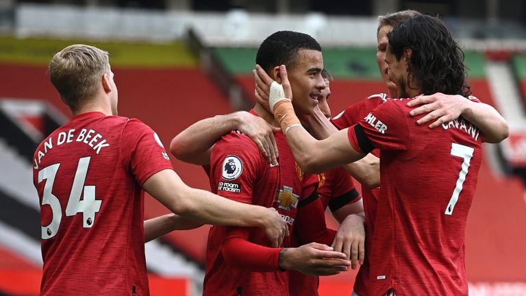 Manchester United&#39;s Mason Greenwood (centre) celebrates scoring his second goal against Burnley