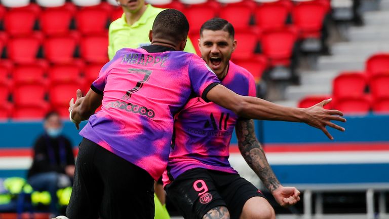 PSG's Kylian Mbappe celebrates with team-mate Mauro Icardi