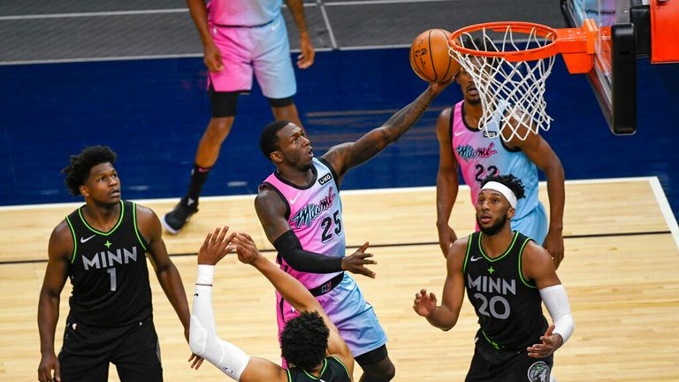 AP - Miami Heat guard Kendrick Nunn (25) goes up for a shot past Minnesota Timberwolves guard Anthony Edwards (1), center Karl-Anthony Towns (32) and forward Josh Okogie (20)