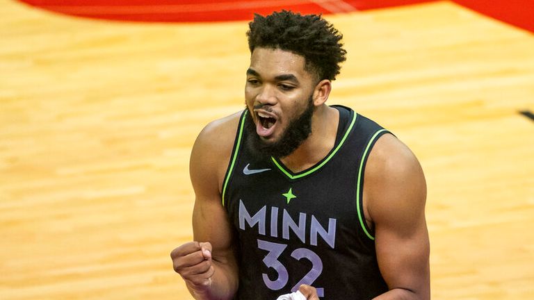 AP - Minnesota Timberwolves center Karl-Anthony Towns reacts after fouling out during the fourth quarter 