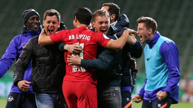 Julian Nagelsmann celebrates on the field after RB Leipz's dramatic extra-time victory over Werder Bremen