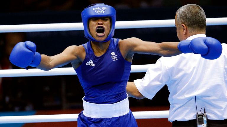 Great Britain's Natasha Jonas, reacts after her fight against the United States' Quanitta Underwood during a women's lightweight boxing match at the 2012 Summer Olympics, Sunday, Aug. 5, 2012, in London. (AP Photo/Patrick Semansky)