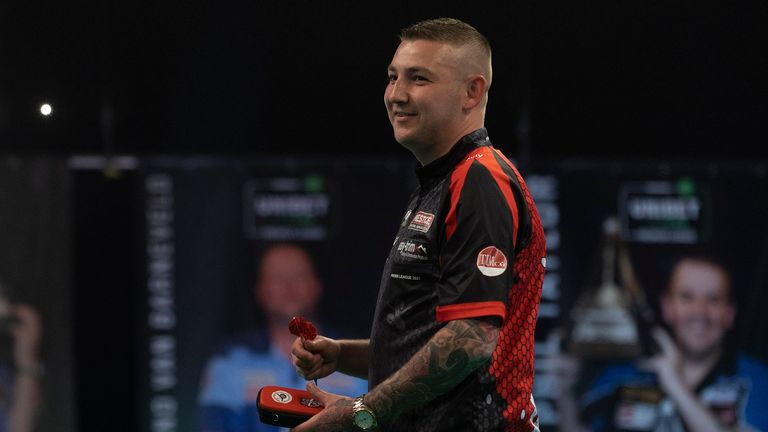 Nathan Aspinall tops the Premier League on leg difference from Dimitri Van den Bergh after the first phase ended in Milton Keynes (Lawrence Lustig/PDC)